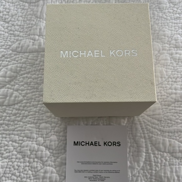 Brand new Michael Kors watch. Has never been worn, and is in perfect condition.